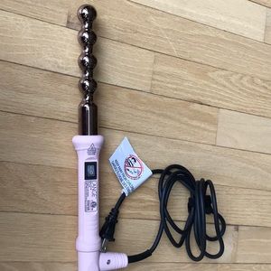 L’ange bubble wand used once pink and black